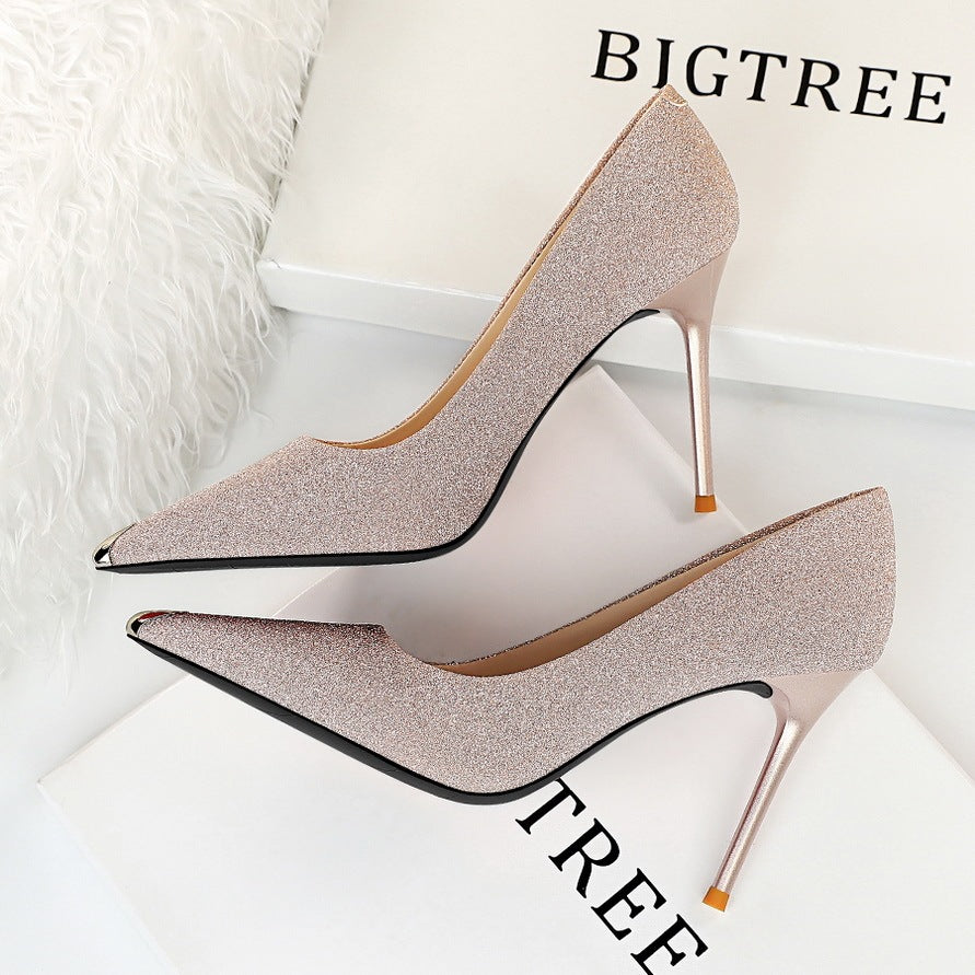 Shallow metal pointed high heels